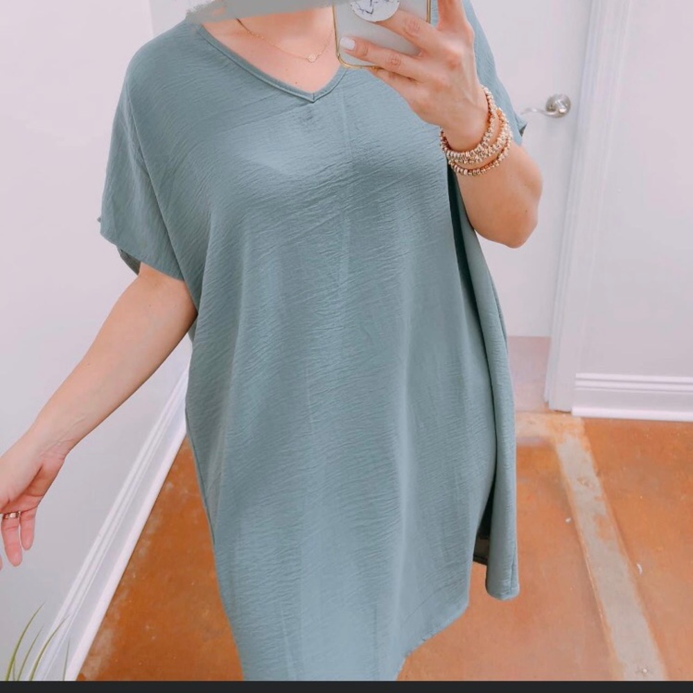 Tres Bien sage green dress. NWOT. ML size. More on large size. Non smoking home